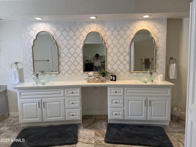 8426 N 15th Dr, Phoenix, AZ 85021 - bathroom featuring baseboards, a sink, recessed lighting, and double vanity