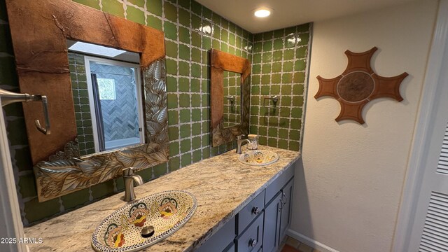 8426 N 15th Dr, Phoenix, AZ 85021 - full bathroom featuring baseboards, a sink, recessed lighting, and double vanity