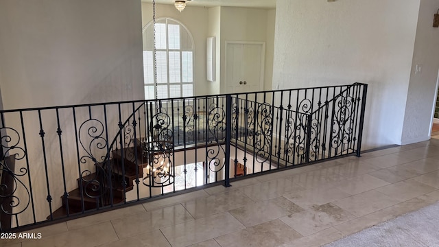 8426 N 15th Dr, Phoenix, AZ 85021 - hall featuring tile patterned floors and an upstairs landing