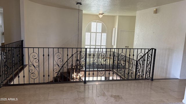 8426 N 15th Dr, Phoenix, AZ 85021 - interior space featuring a textured ceiling, tile patterned floors, and an upstairs landing