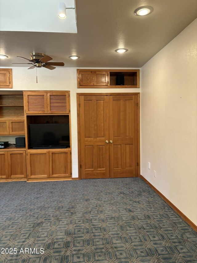 8426 N 15th Dr, Phoenix, AZ 85021 - unfurnished living room with ceiling fan, baseboards, and recessed lighting