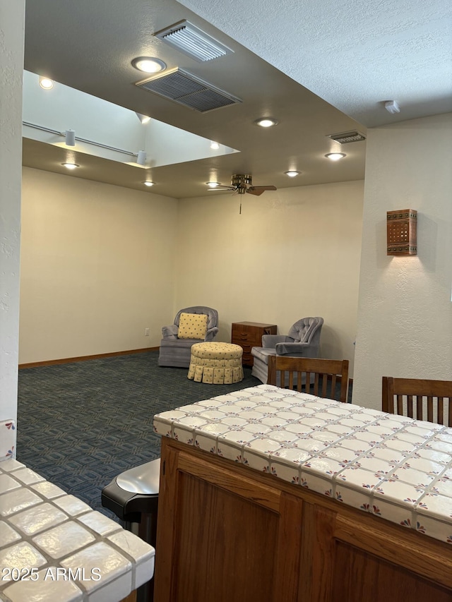 8426 N 15th Dr, Phoenix, AZ 85021 - bathroom featuring visible vents, a textured ceiling, and recessed lighting