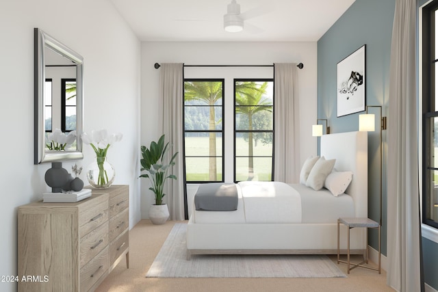 bedroom featuring light carpet