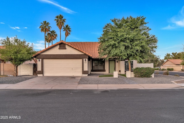 1001 N Nielson St, Gilbert, AZ 85234 - single story home with stucco siding, an attached garage, driveway, and a tiled roof
