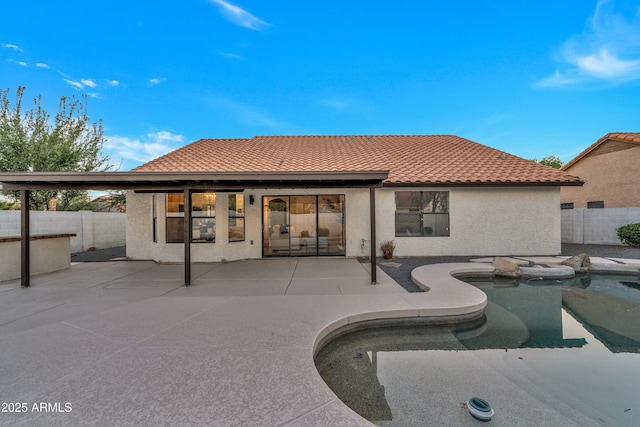 1001 N Nielson St, Gilbert, AZ 85234 - rear view of property featuring a fenced backyard, a patio, stucco siding, and a tile roof