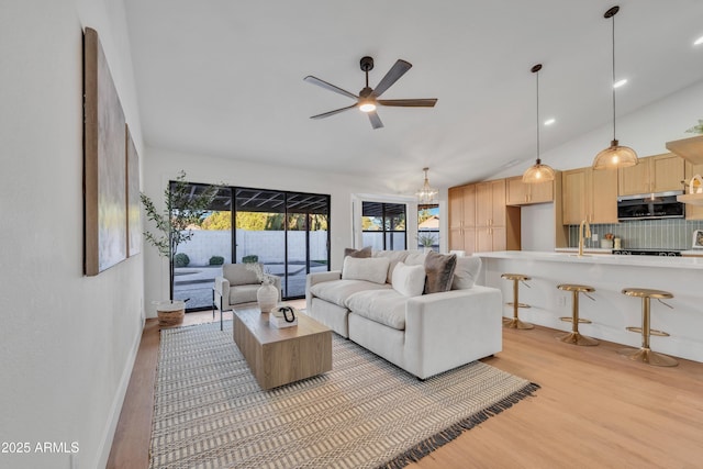 1001 N Nielson St, Gilbert, AZ 85234 - living area featuring light wood-style floors, a ceiling fan, and lofted ceiling