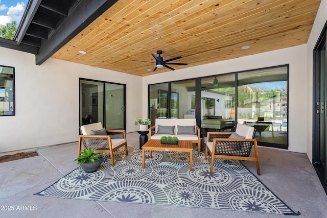 view of patio / terrace with ceiling fan and an outdoor hangout area