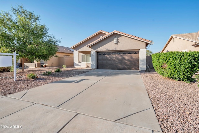 view of front of home featuring a garage