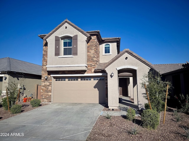 view of front of home with a garage