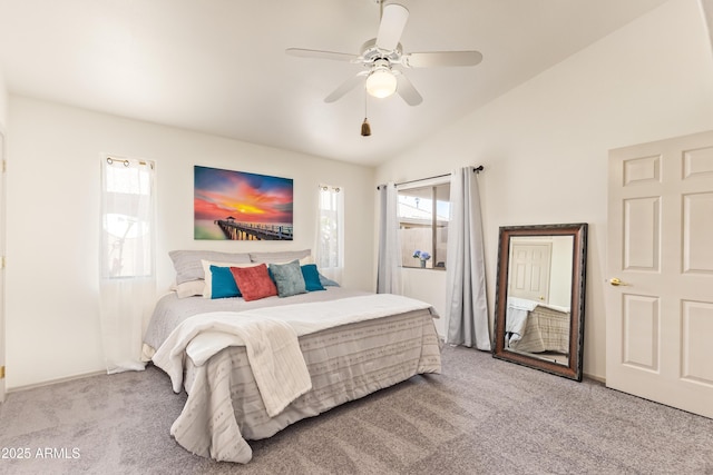 bedroom with carpet flooring, lofted ceiling, ceiling fan, and baseboards