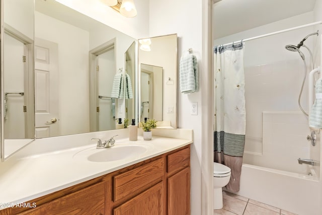 bathroom with toilet, tile patterned floors, vanity, and shower / bath combination with curtain
