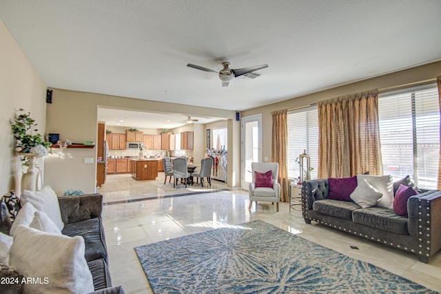 living room featuring ceiling fan