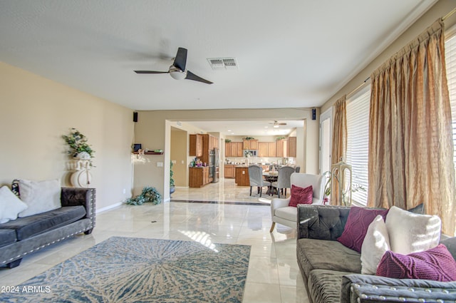 living room with ceiling fan