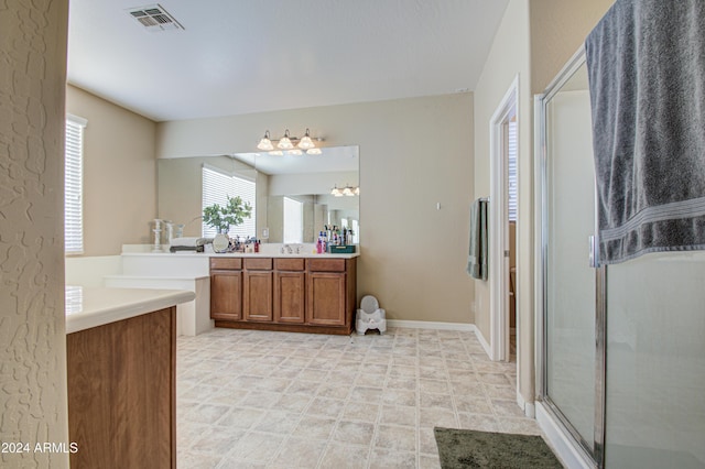 bathroom with vanity and walk in shower