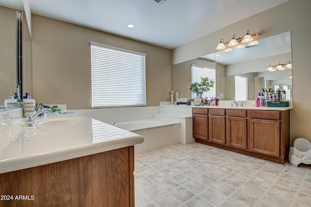 bathroom featuring vanity and a bathtub