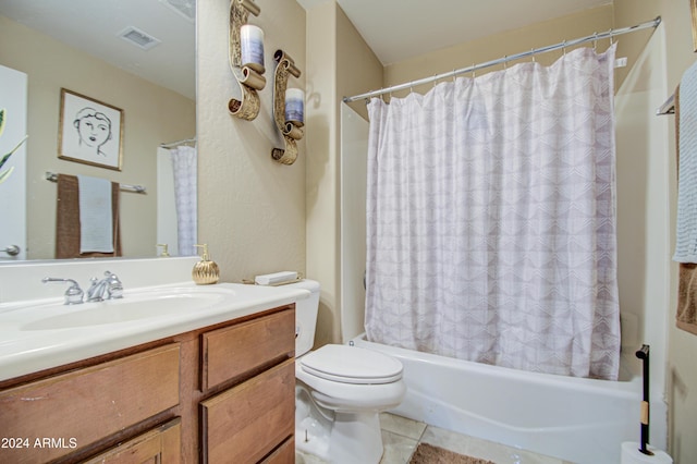 full bathroom with tile patterned flooring, vanity, shower / bath combination with curtain, and toilet