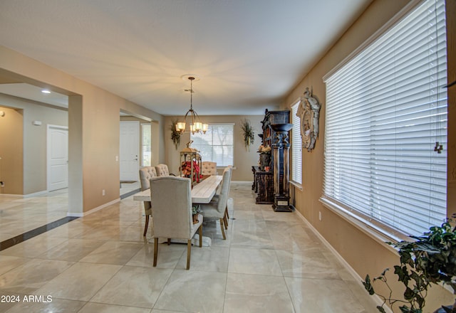 dining area with a chandelier