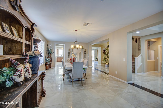 dining room featuring an inviting chandelier