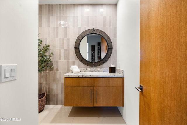 9894 E Miramonte Dr, Scottsdale, AZ 85262 - bathroom featuring vanity, tile patterned flooring, and tile walls