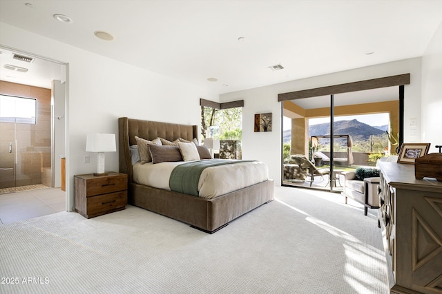 9894 E Miramonte Dr, Scottsdale, AZ 85262 - bedroom featuring access to exterior, light colored carpet, ensuite bath, and a mountain view