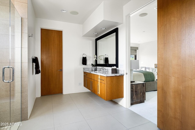 9894 E Miramonte Dr, Scottsdale, AZ 85262 - ensuite bathroom with a stall shower, vanity, and tile patterned flooring
