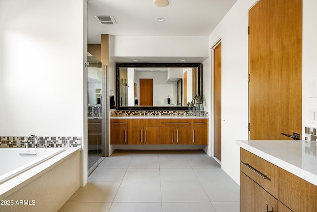 9894 E Miramonte Dr, Scottsdale, AZ 85262 - full bath with vanity, a stall shower, a bath, and tile patterned floors