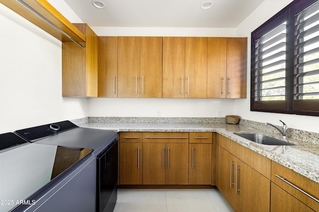 9894 E Miramonte Dr, Scottsdale, AZ 85262 - laundry room with washer / dryer, light tile patterned floors, and cabinet space