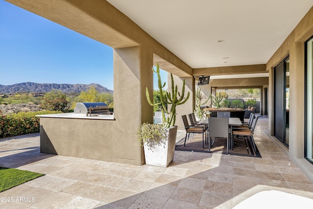 9894 E Miramonte Dr, Scottsdale, AZ 85262 - view of patio / terrace featuring a mountain view and outdoor dining space