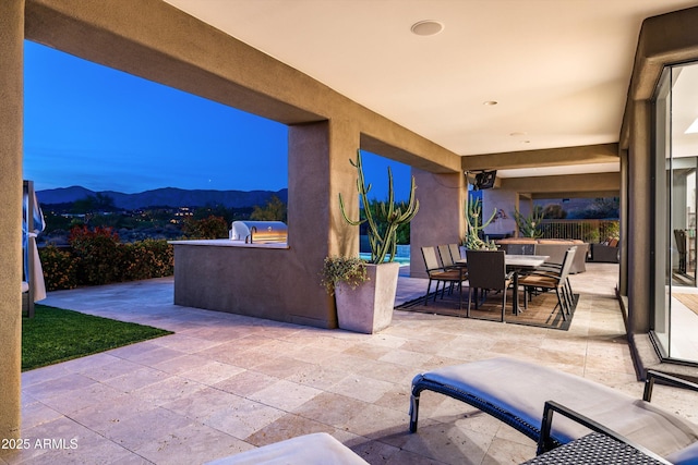 9894 E Miramonte Dr, Scottsdale, AZ 85262 - view of patio / terrace featuring a mountain view, area for grilling, and outdoor dining area