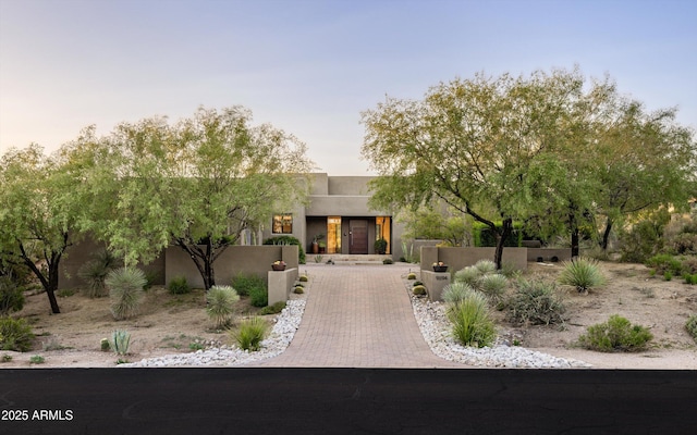 9894 E Miramonte Dr, Scottsdale, AZ 85262 - pueblo-style home with a fenced front yard and stucco siding