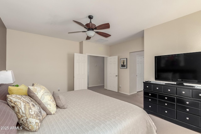 bedroom featuring ceiling fan and light colored carpet