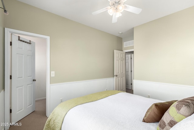 bedroom featuring ceiling fan and carpet floors