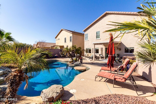 view of swimming pool featuring a patio