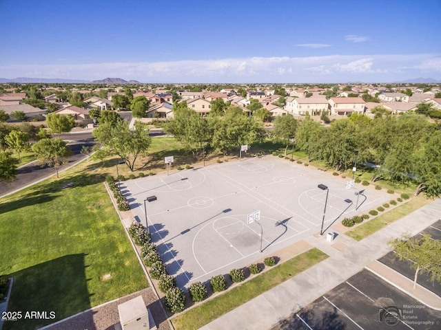 birds eye view of property with a mountain view