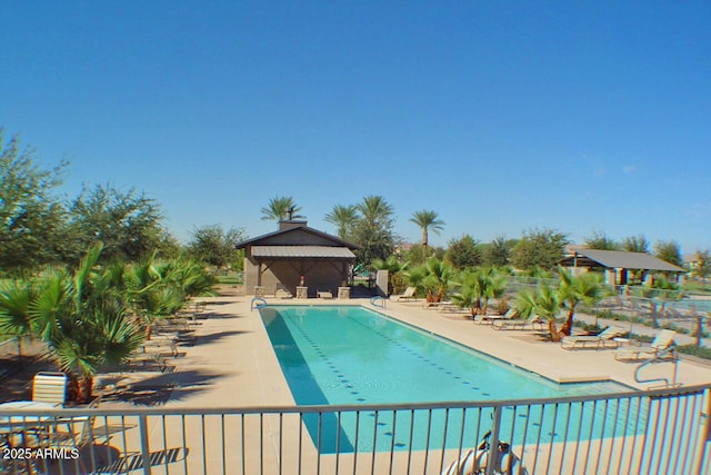 view of swimming pool with a gazebo and a patio