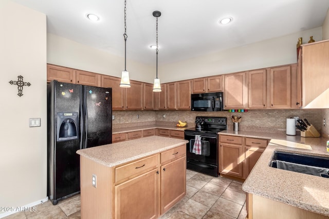 kitchen with light stone countertops, black appliances, decorative backsplash, a kitchen island, and decorative light fixtures