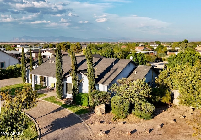 drone / aerial view featuring a mountain view