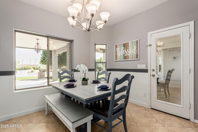 26719 S 195th St, Queen Creek, AZ 85142 - dining room featuring light tile patterned floors, a notable chandelier, and baseboards