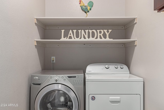 laundry area with washer and clothes dryer