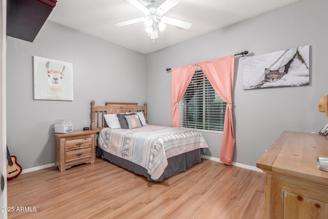 bedroom featuring light wood-type flooring and ceiling fan