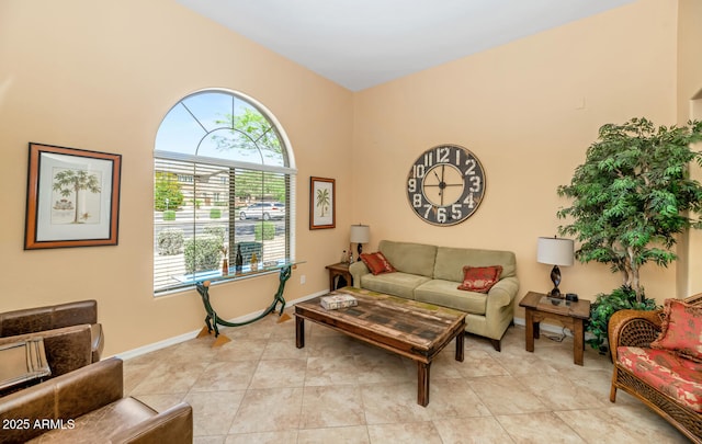 3932 E Melinda Dr, Phoenix, AZ 85050 - living area with light tile patterned floors and baseboards