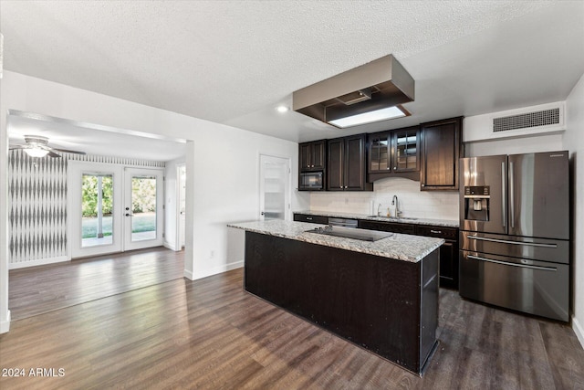 8420 E Hubbell St, Scottsdale, AZ 85257 - kitchen featuring black appliances, a sink, dark wood finished floors, baseboards, and a textured ceiling