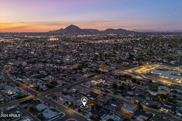 aerial view at dusk with a mountain view