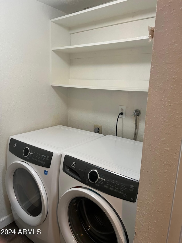 washroom featuring independent washer and dryer