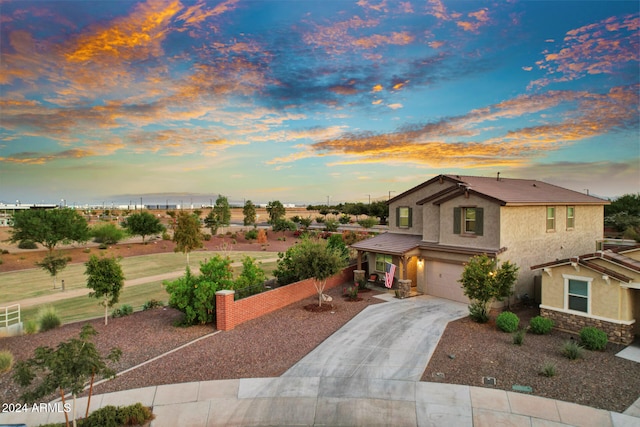 view of front of property featuring a garage