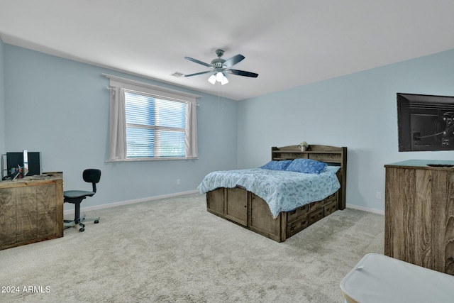 bedroom featuring ceiling fan and light colored carpet