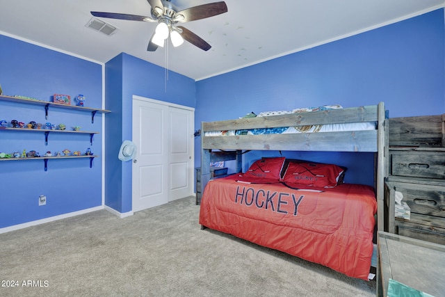 carpeted bedroom with ceiling fan