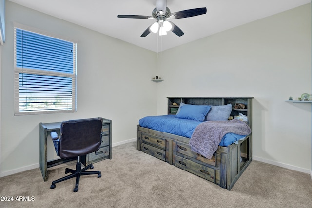 carpeted bedroom featuring ceiling fan