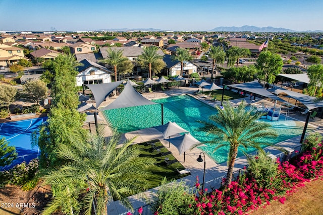 birds eye view of property featuring a mountain view