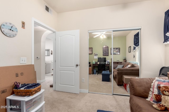 carpeted bedroom featuring a closet